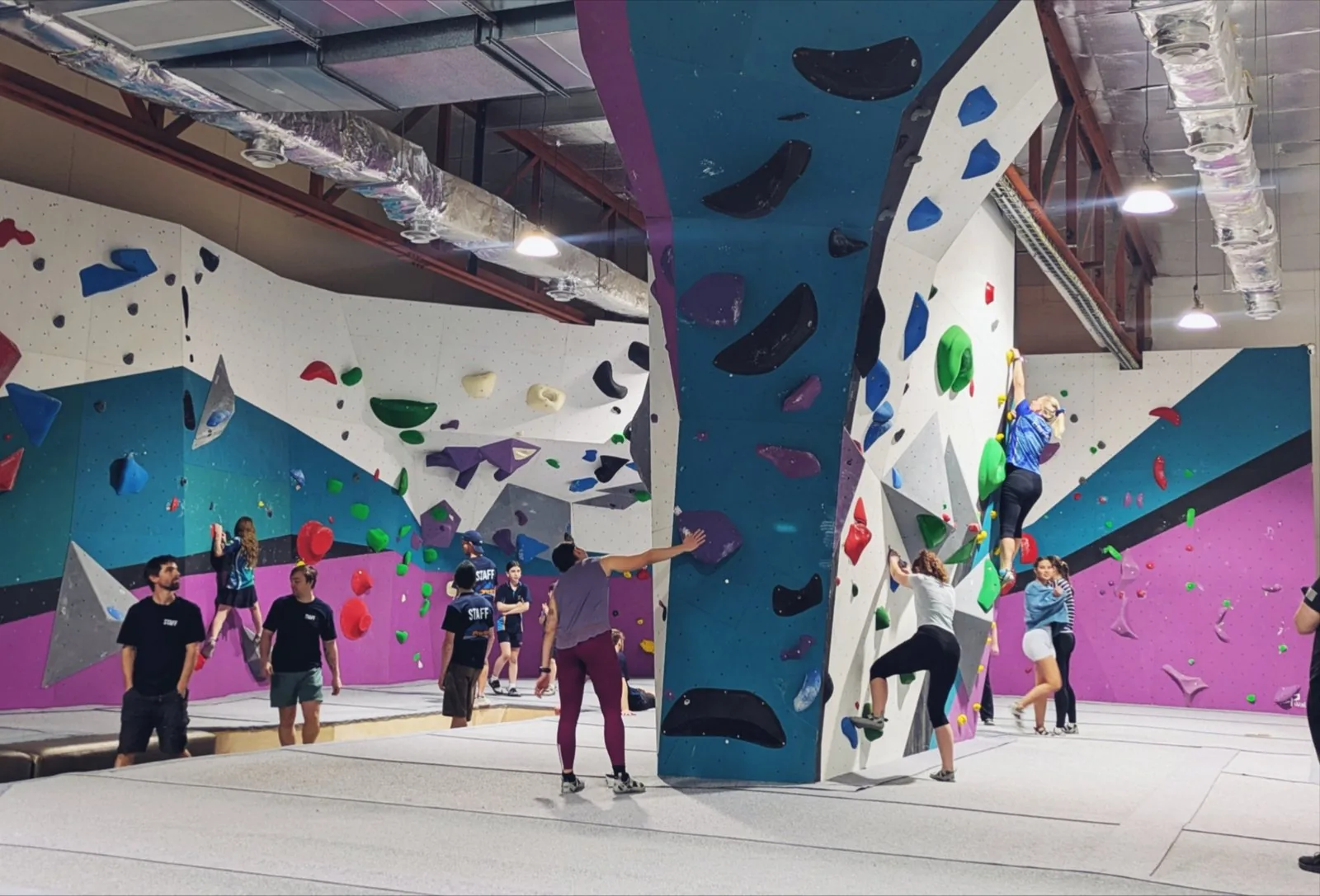 Climbers and staff on the bouldering walls at GRIPswich, Ipswich